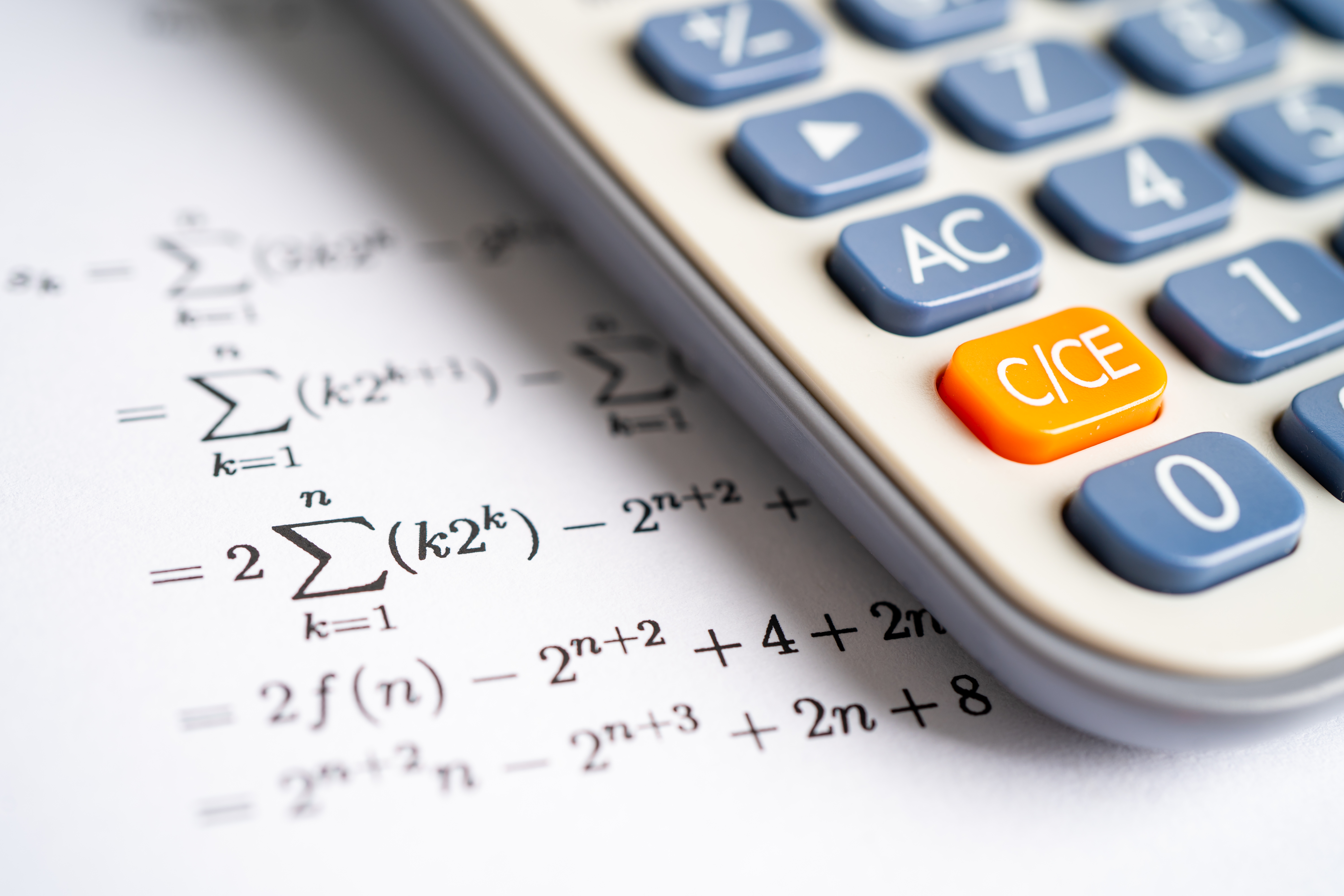 vecteezy_pencil-and-calculator-on-mathematic-formula-exercise-test_6278174.jpg