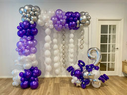 Balloons decoration of white purple