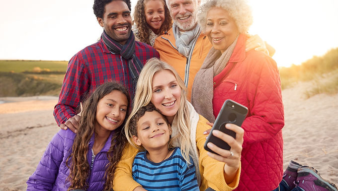 Female supported by her family because of the My SOS Family App