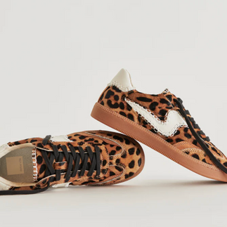Cheetah print sneakers with a white embellishment