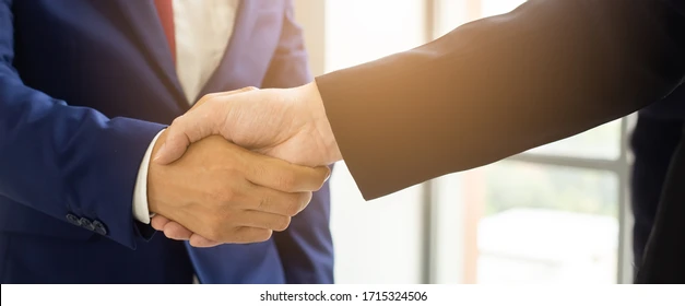 close-businessman-man-businesswoman-handshake-260nw-1715324506.webp