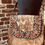 Thumbnail: Light Brown and White Cowhide Tooled Leather Purse 