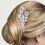 Thumbnail: Rainbow-Silver Rhinestone Flower Swirl Hair Comb