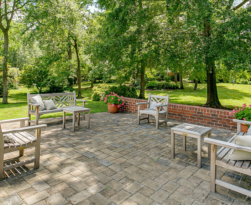 outdoor patio with grey brick pavers