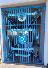 Repainted Eagle Court gates 20250505 cropped.jpg