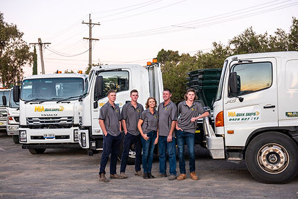 Family in front of trucks.jpg