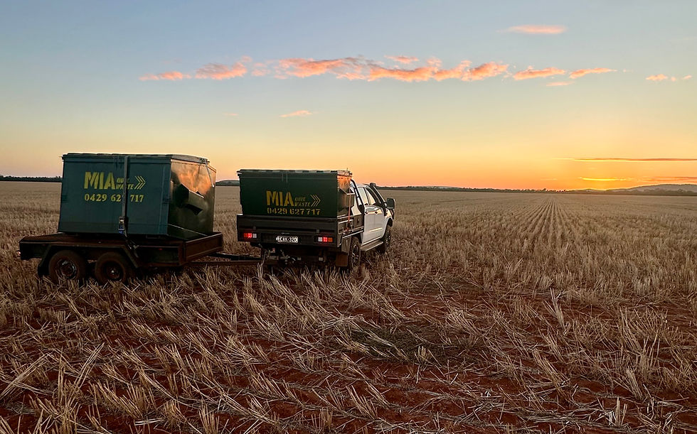 Skip bin being delivered on a Riverina farm clearing rural waste