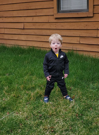 Little boy  enjoying outside playtime. It's always great to get outside and run around