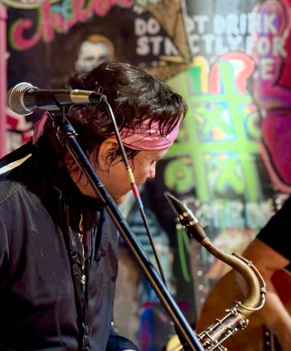Aj rodie joes sax looking away_enhance_edited.jpg