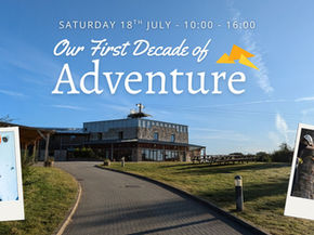 A photo of Mount Cook Centre with 'Our First Decade of Adventure' written in the sky 