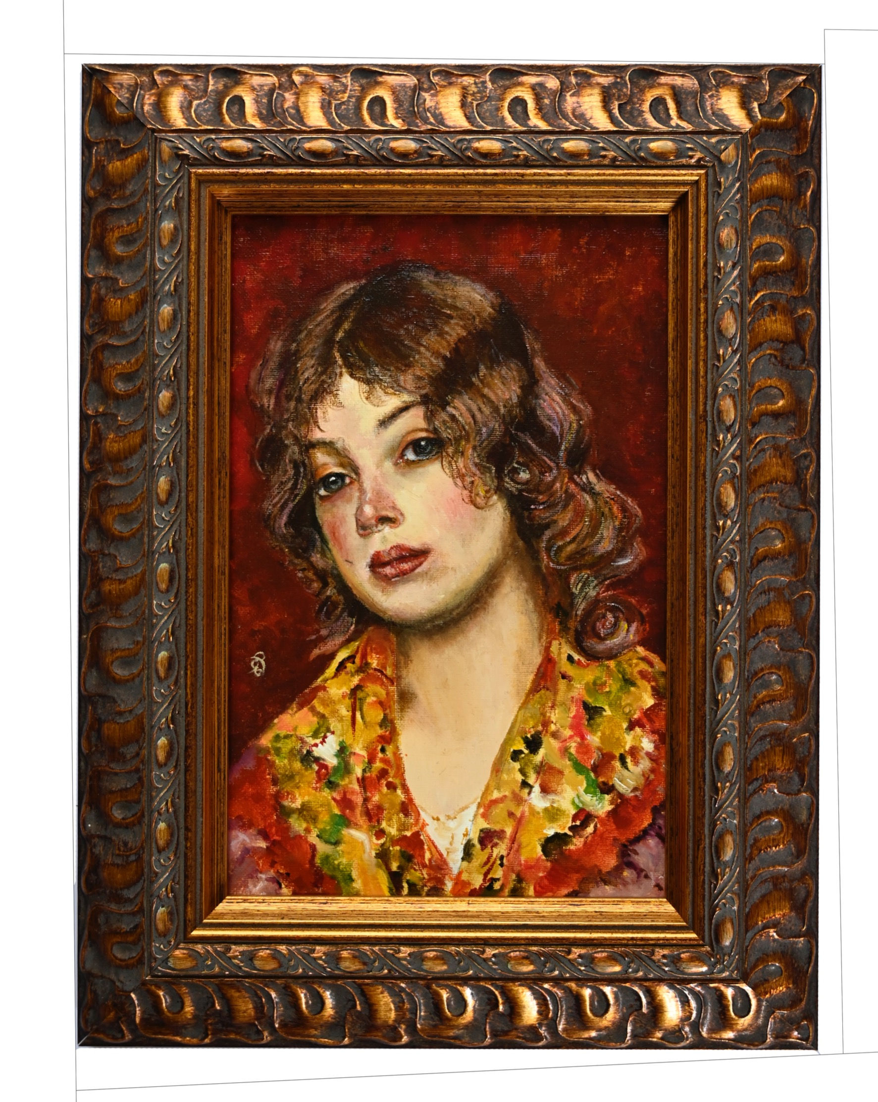 Young girl in coloured blouse, unhappy face