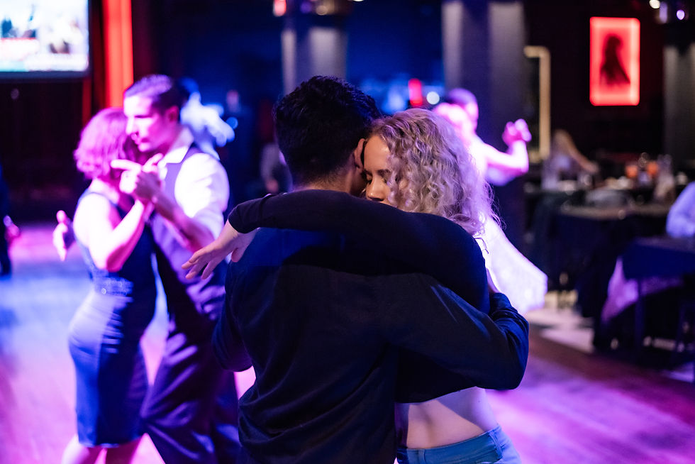 tango dancers at a milonga