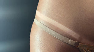 How to Avoid Tan Lines with a Professional Spray Tan