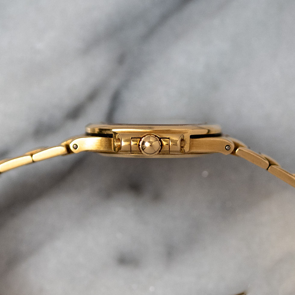 Thumbnail: Patek Philippe Nautilus Mini Yellow Gold