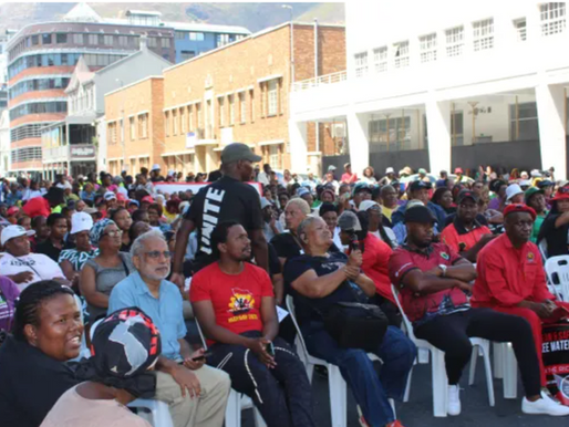 People Against Budget Cuts march to South African parliament to demand a pro-poor budget