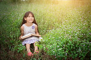 little-cute-asian-girl-reading-book-natu