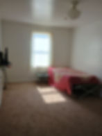 Secondary bedroom boasting great natural light, located in a quiet Arkansas Valley neighborhood.