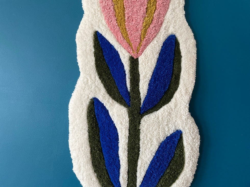 Thumbnail: Hand-tufted wall hanging of stylised seed heads in rich, folk-inspired colours, soft textured surface, cork backing