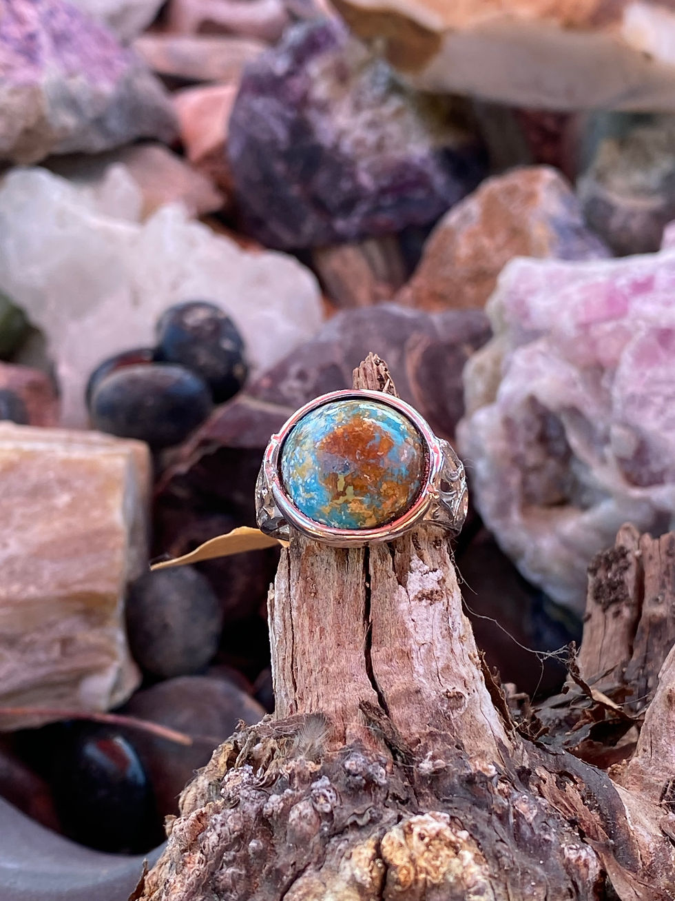 Close-up of untreated turquoise ring, highlighting the natural colors and textures of the turquoise stone.