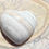 Thumbnail: Close-up of polished Banded Agate heart showcasing its natural patterns and earthy hues.