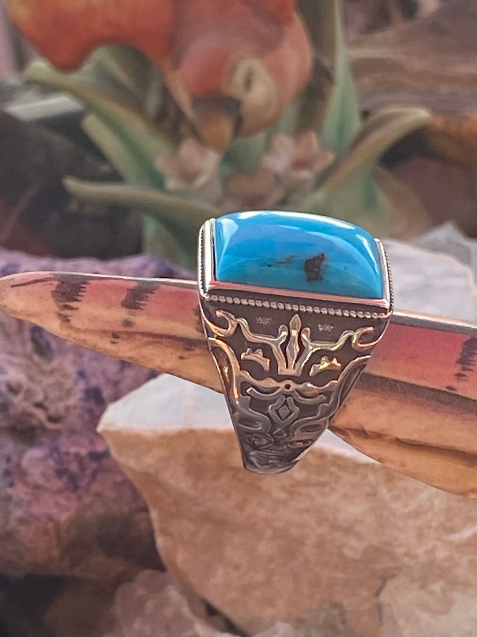 Thumbnail: Arizona turquoise ring with a rectangular cabochon stone, displaying bright blue hues and intricate silverwork.