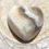 Thumbnail: Close-up of polished Banded Agate heart showcasing its natural patterns and earthy hues.