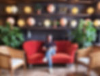 Stuart Bamford sitting in red sofa