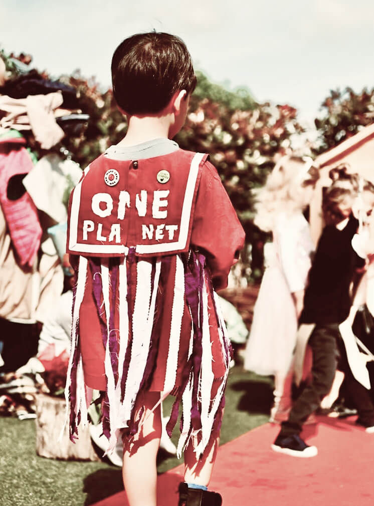 Boy with red cape