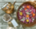 AD by Dart Valley Station organic Cornflower Calendula foot soak with flowers and copper bowl.