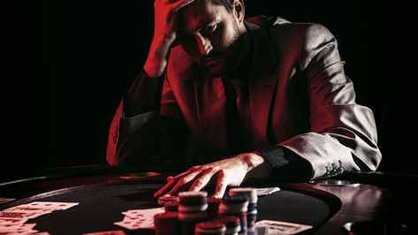 How can a Peer Support Worker help a person who is ADDICTED TO GAMBLING?