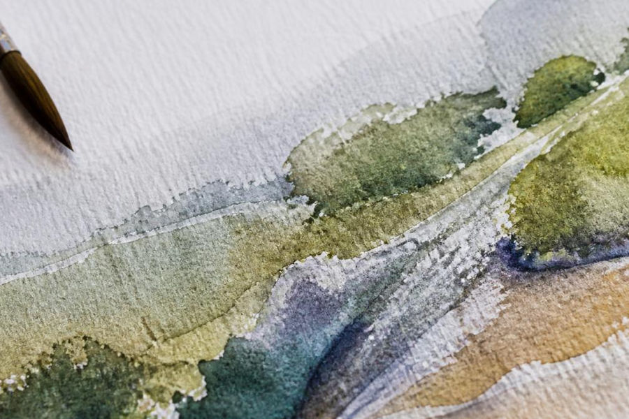 Close-up detail of a hand-painted watercolor showing visible brushstrokes, layered transparent washes, and natural texture variations on cold-pressed watercolor paper with subtle color bleeding
