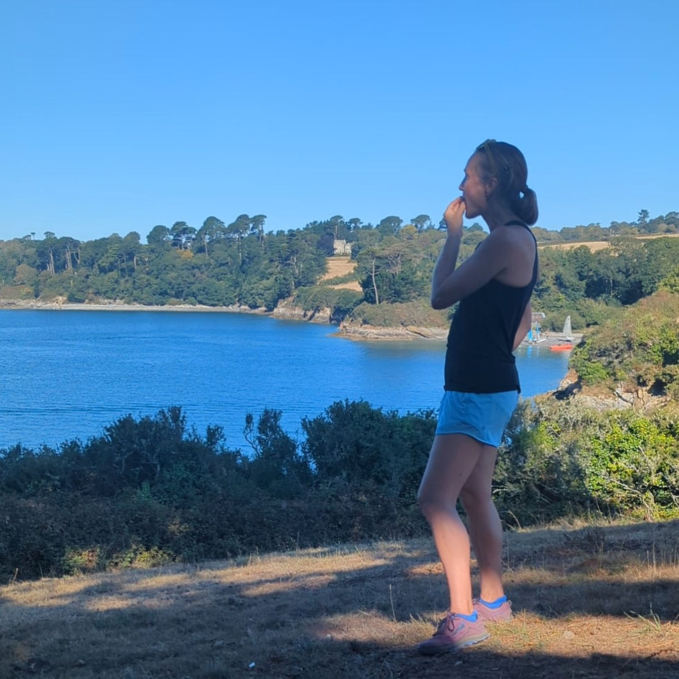 Picture of sports nutritionist at Eat Well Perform Better on the South West Coast Path eating snacks