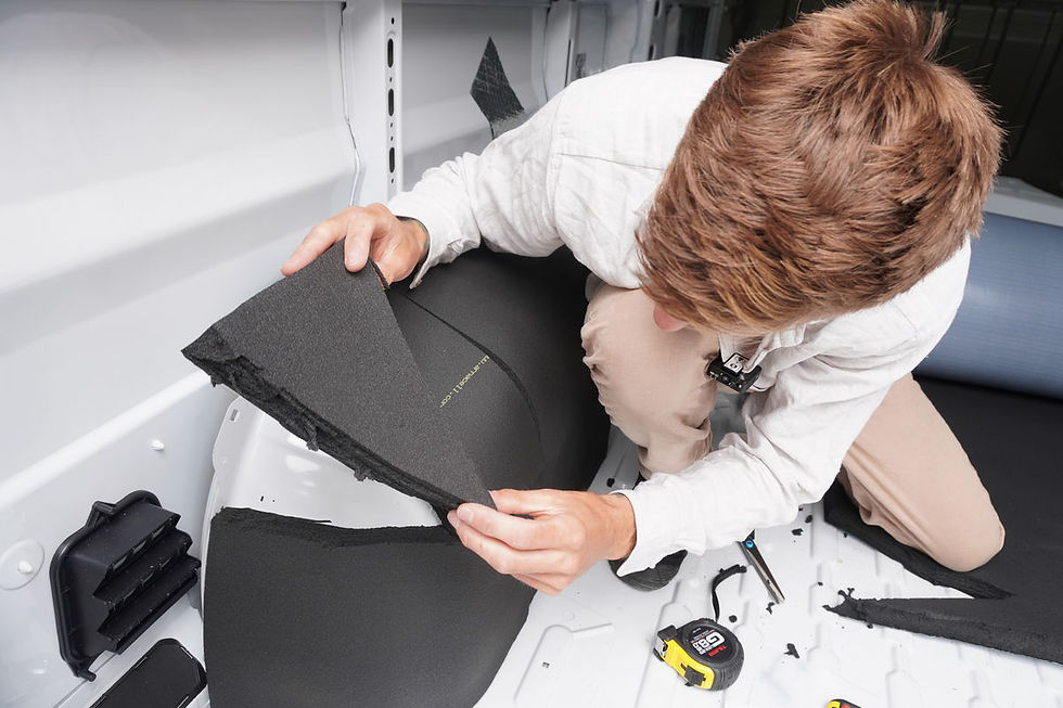 in-progress shot of insulating van wheel arch