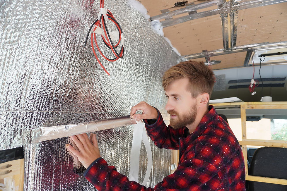 taping up the laps between vapour barrier sheets with foil tape