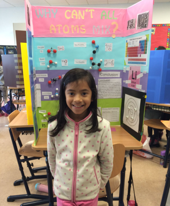 Me (age 8) with my science fair project