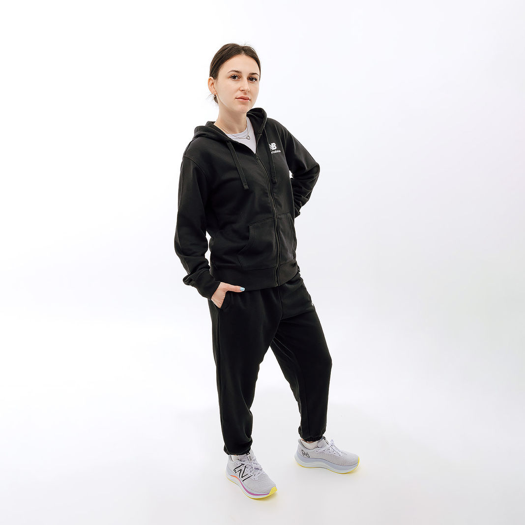 Штани New Balance Essentials Reimagined Arch. WP31508BK