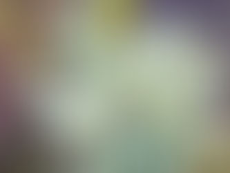 Close up photo of oakmoss. Possesses a texture similar to coral or seaweed. It is light aqua marine green with olive low lights.