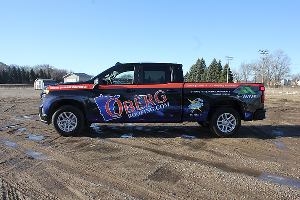 Boost your roofing business visibility with custom truck graphics from Mustang Signs and Graphics, providing a professional and eye-catching look.