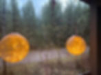 Glimmery spheres from a cabin at a outdoor wedding venue by Missoula, Montana