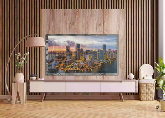 An image of a Mirror TV installed within a living room. When the Mirror TV is turned on it shows content through the mirror.