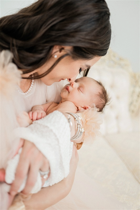 Mom and newborn, snuggling