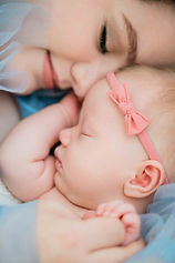 mom holding newborn