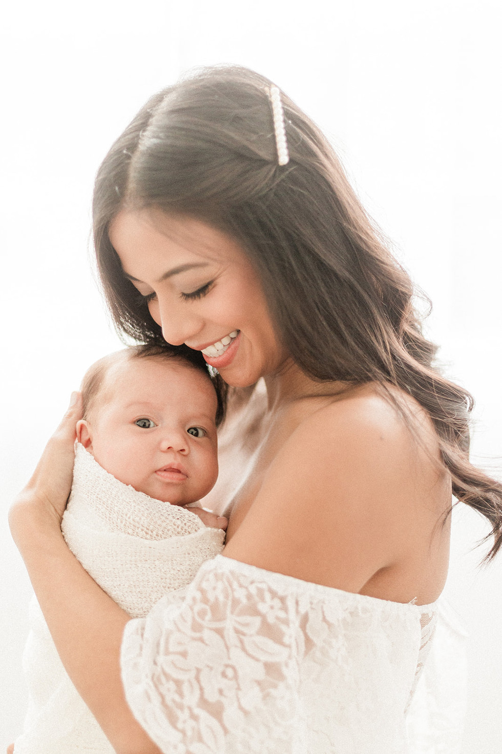 Mom holding a newborn baby