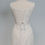 Thumbnail: Top half back view of vintage corset wedding dress