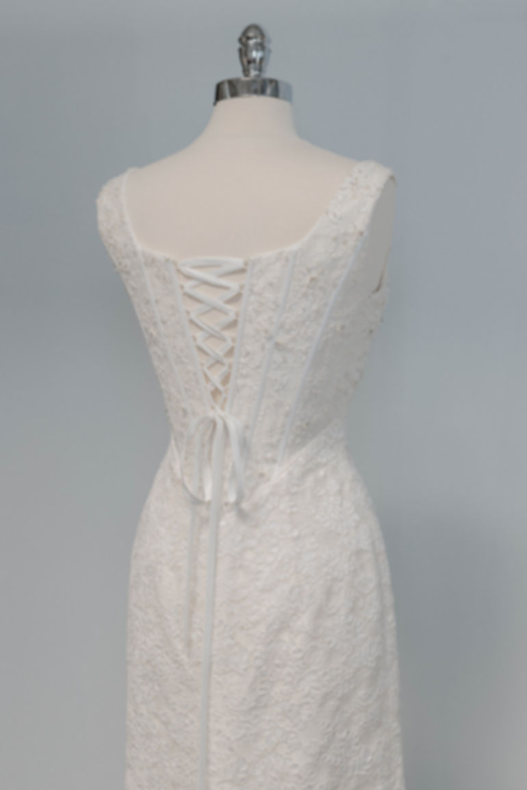 Top half back view of vintage corset wedding dress