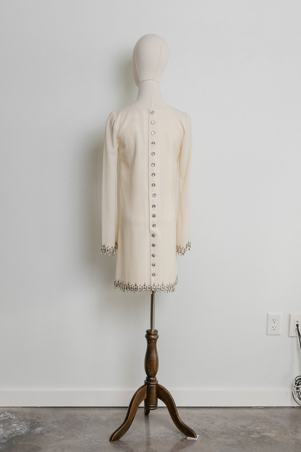 Thumbnail: Vintage Loris Azzaro bridal mini dress on dress form in Atlanta vintage bridal shop