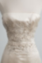 Close up of beading and embroidery on vintage Vera Wang wedding dress