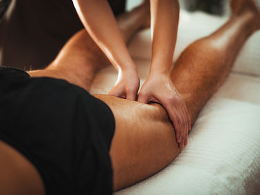 Physiotherapist is doing sports deep tissue massage in Physio Pattern Manchester clinic