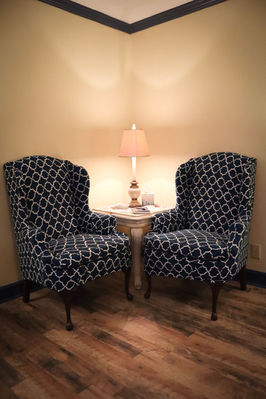 sitting_area_with_wing_back_chairs