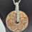 Thumbnail: Carved soapstone doughnut pendant